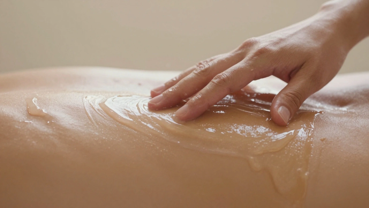 Close-up of hands gliding over skin coated in shimmering seaweed gel, emphasizing fluid motion and tactile warmth.